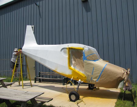 Final painting of the Stinson fuselage